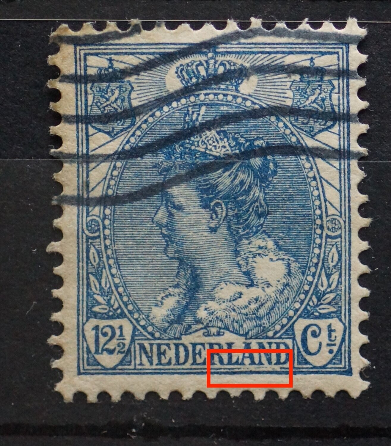 NVPH 63 - grote beschadiging kaderlijn onder AND van NEDERLAND
