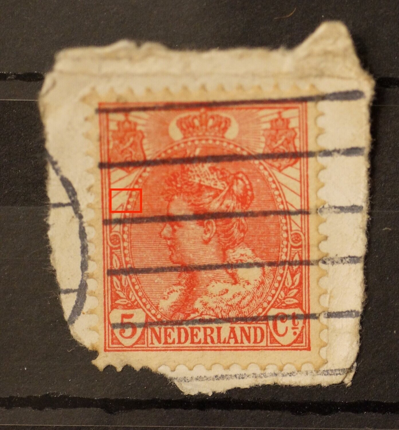 NVPH 60 - beschadiging rand medaillon, links