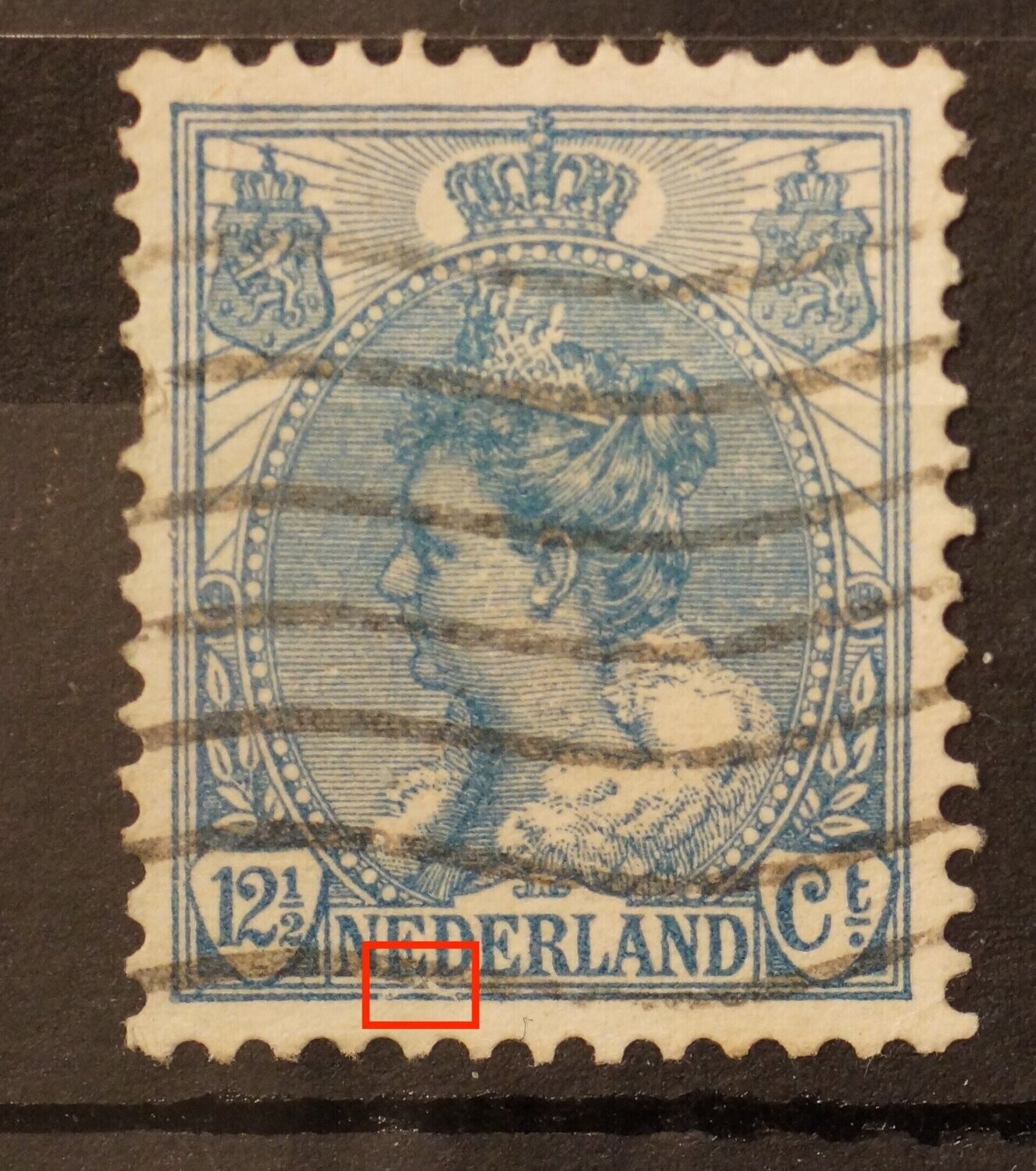 NVPH 63 - beschadiging kaderlijnen onder ED van NEDERLAND