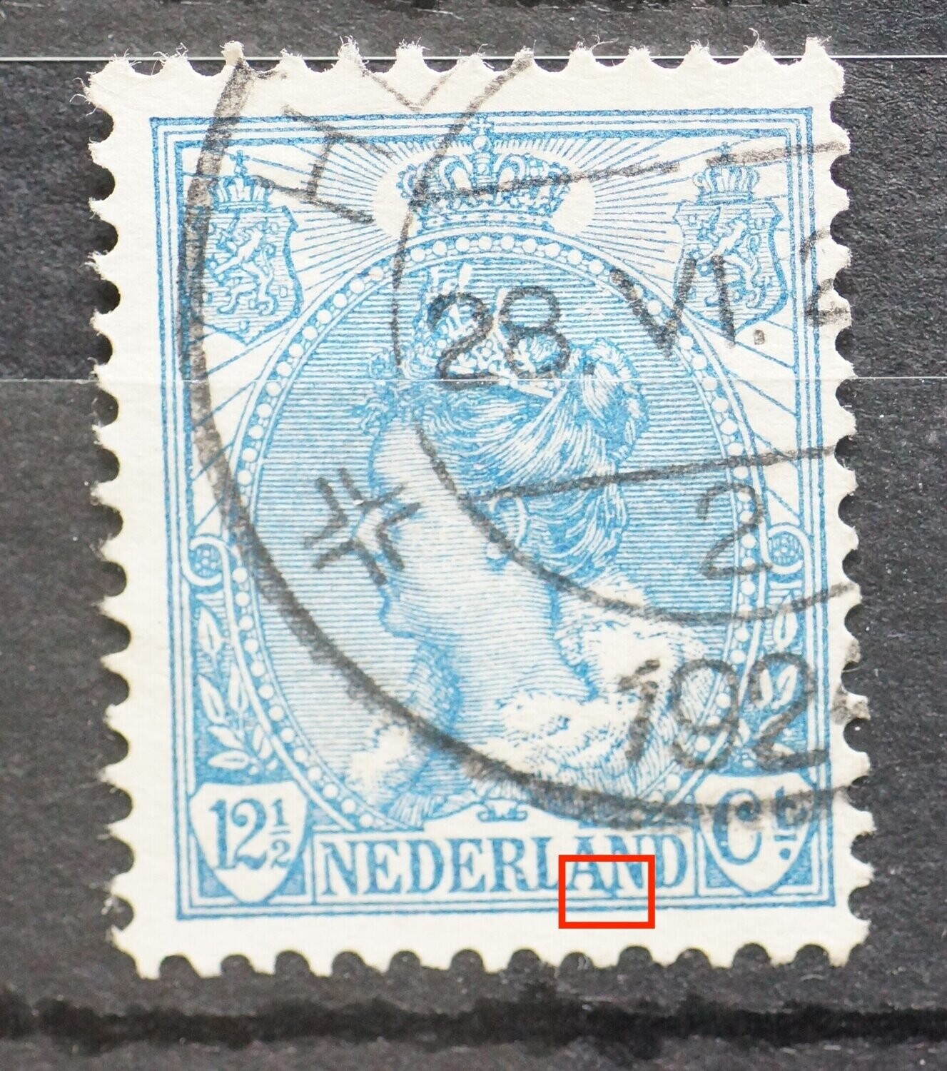 NVPH 63 - blauwe stip onder AN van NEDERLAND