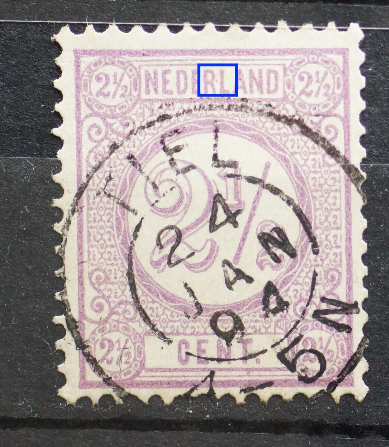 NVPH 33 - violette stip tussen RL van NEDERLAND