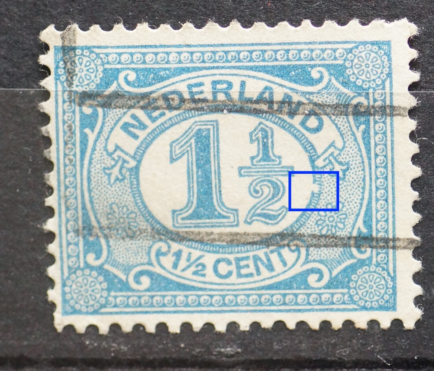 NVPH 53 - witte vlek in rand medaillon rechts NVPH 53 - witte vlek in rand medaillon rechts