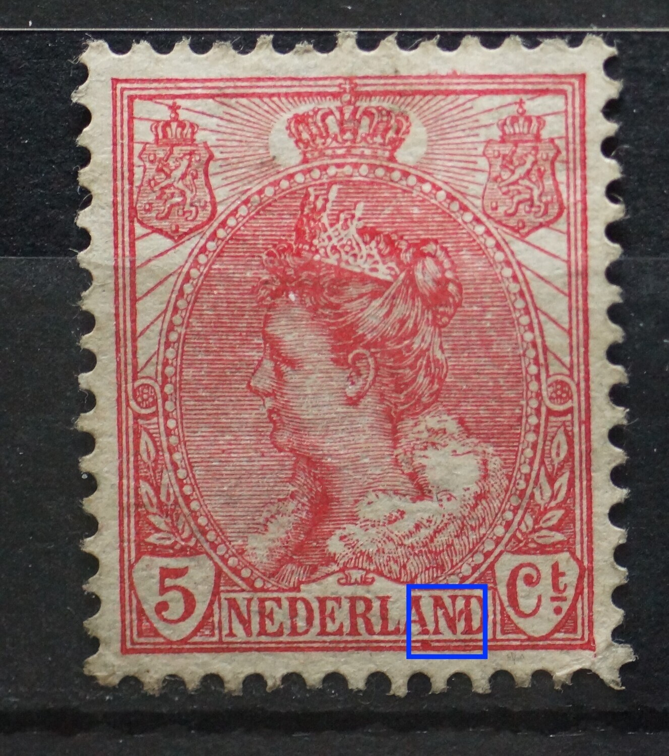 NVPH 60 - rode vlekken rondom AND van NEDERLAND