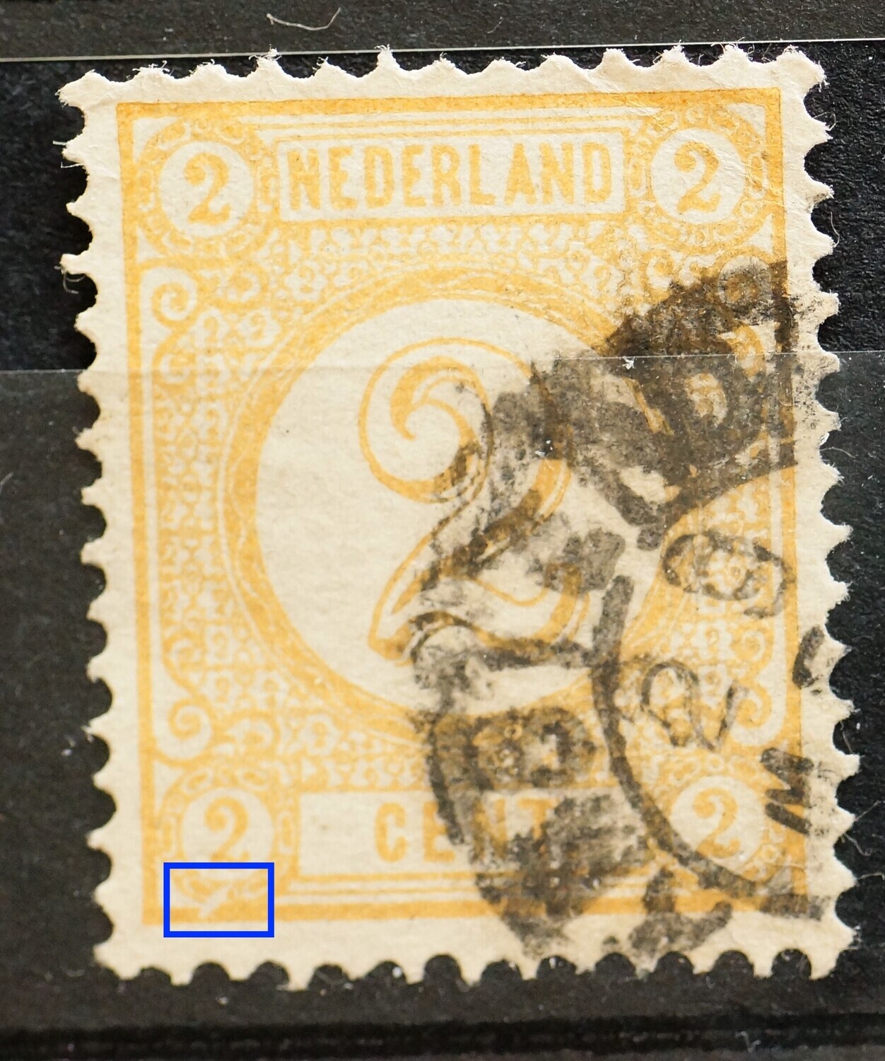 NVPH 32 - witte vlek/breuk onder de 2 linksonder