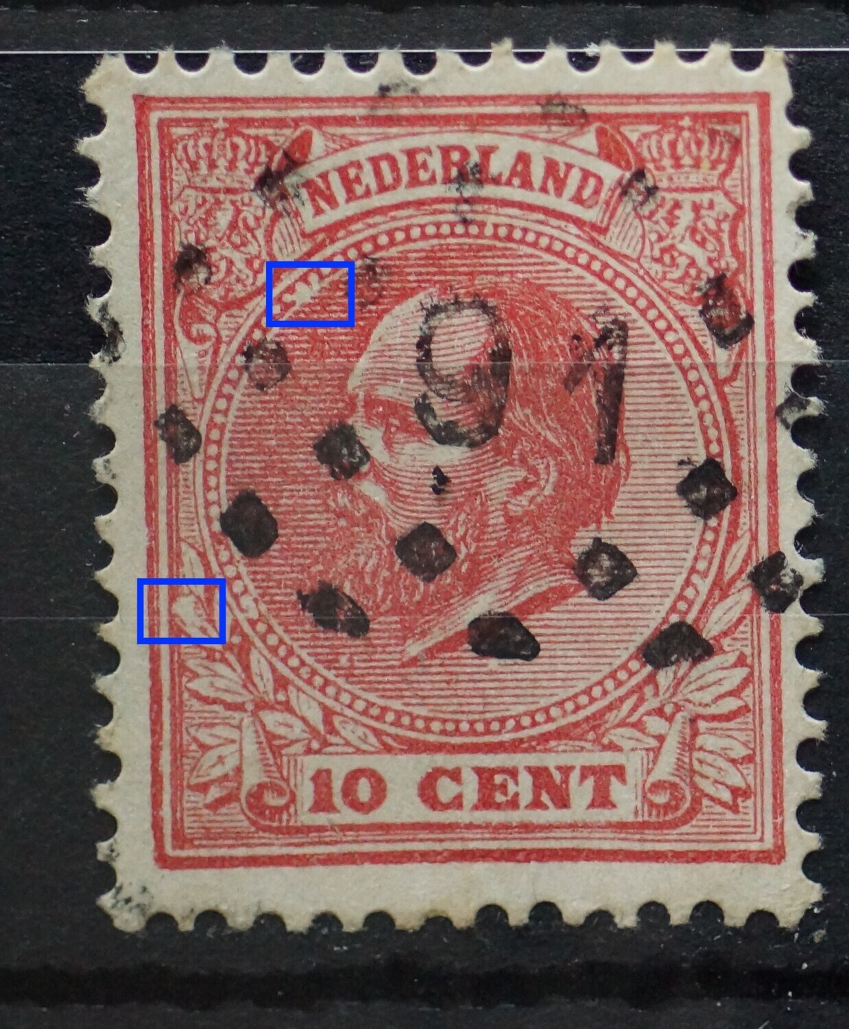 NVPH 21 - witte vlek in bovenste blad links en in de parelrand NVPH 21 - witte vlek in bovenste blad links en in de parelrand