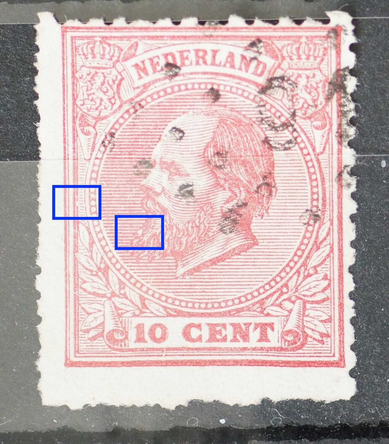 NVPH 21 - breuk in kaderlijn links en witte vlek in baard NVPH 21 - breuk in kaderlijn links en witte vlek in baard