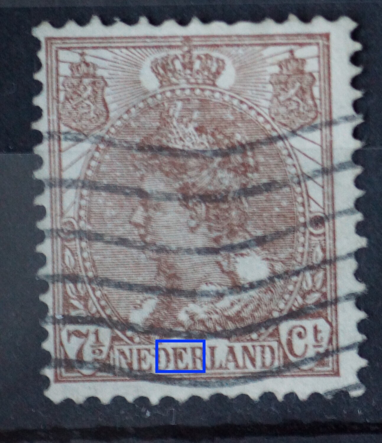 NVPH 61 - bruine vlek in tweede E van NEDERLAND NVPH 61 - bruine vlek in tweede E van NEDERLAND