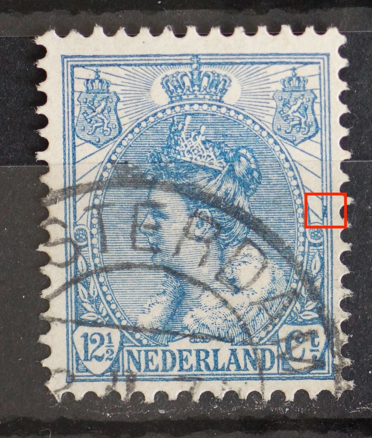 NVPH 63 - blauwe vlek tussen kaderlijnen rechts