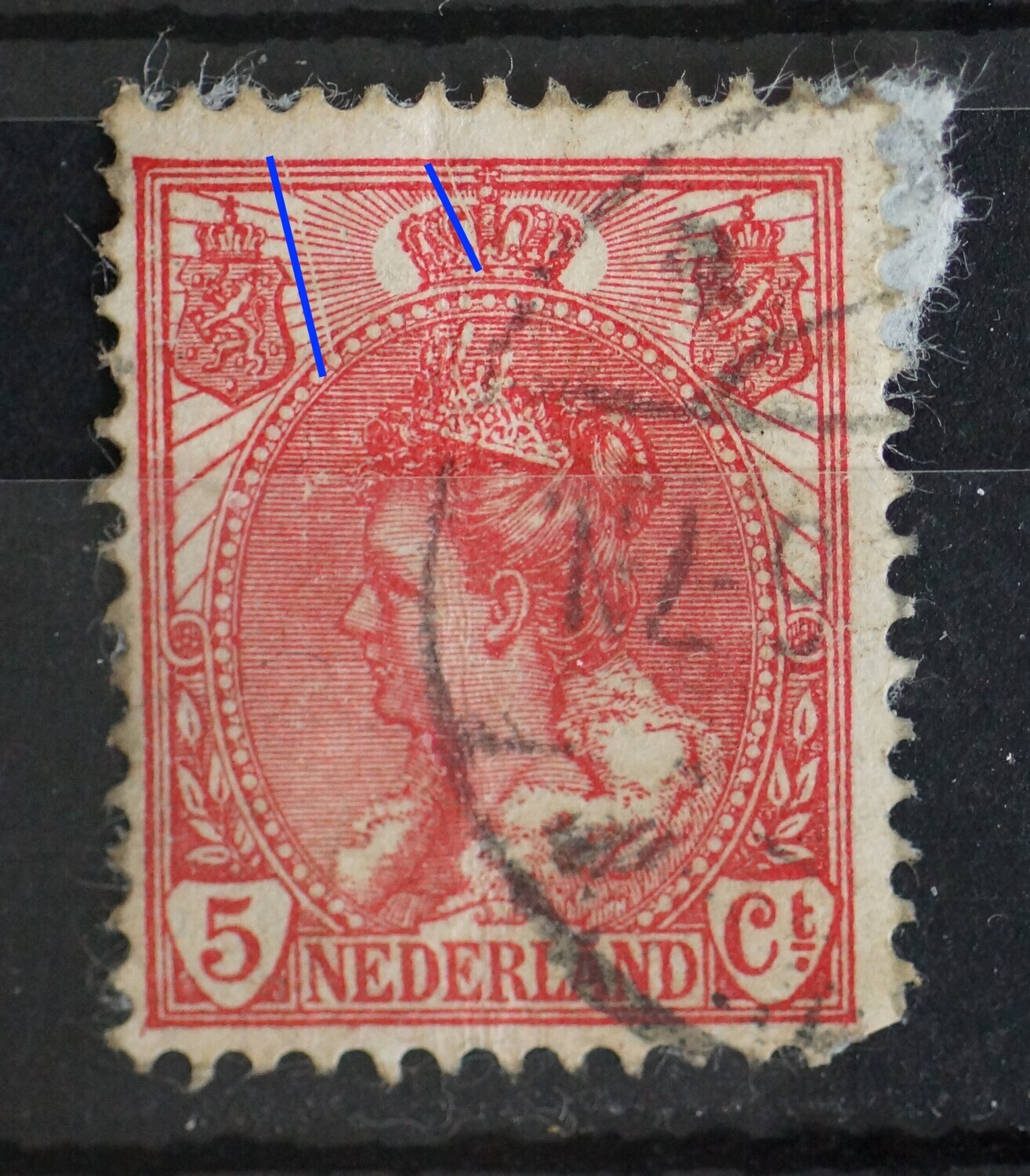 NVPH 60 - twee graveerkrassen bovenste deel zegel