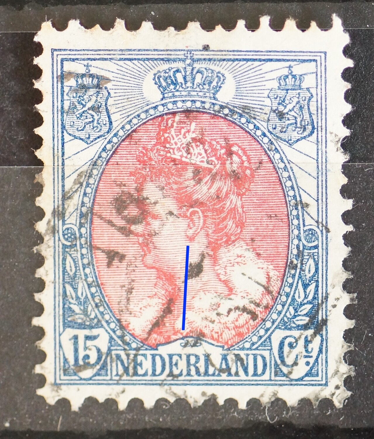 NVPH 65 - verticale witte kras in het gezicht