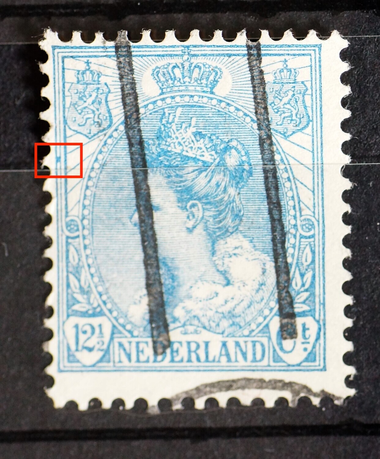 NVPH 63 - blauwe vlek tussen kaderlijnen links