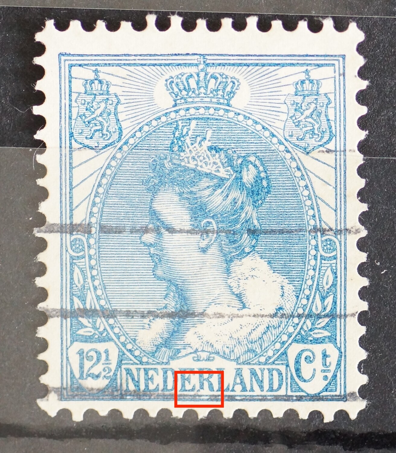 NVPH 63 - beschadigde voet van de R van NEDERLAND