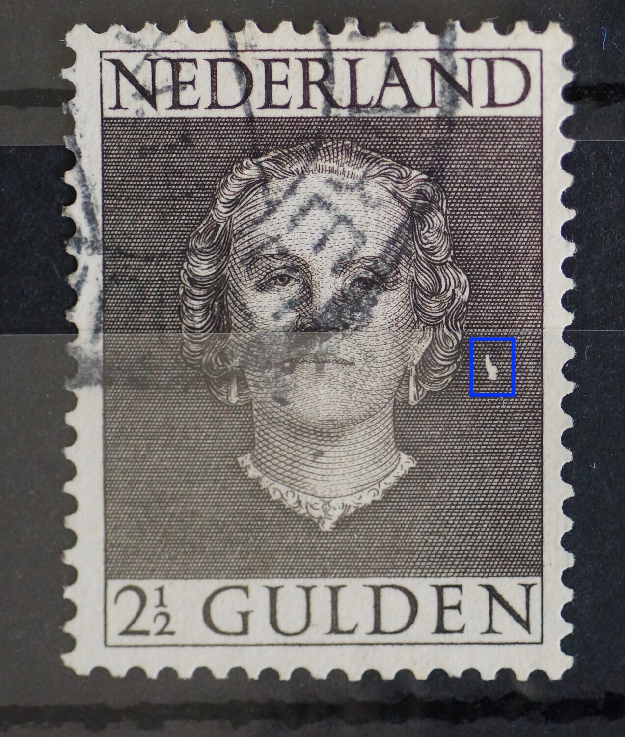 NVPH 55 - grote witte vlek in de arcering rechts