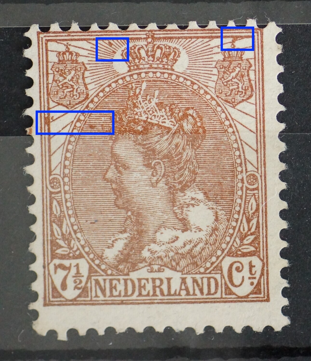 NVPH 61 - o.a. bruine vlekken op diverse plaatsen bovenin het zegelbeeld