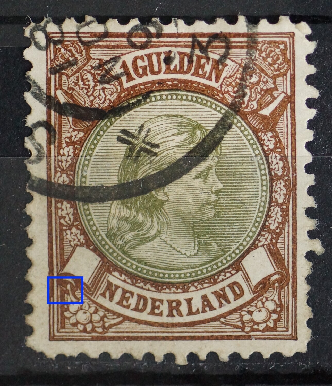 NVPH 46 - bruine vlek onder krul links