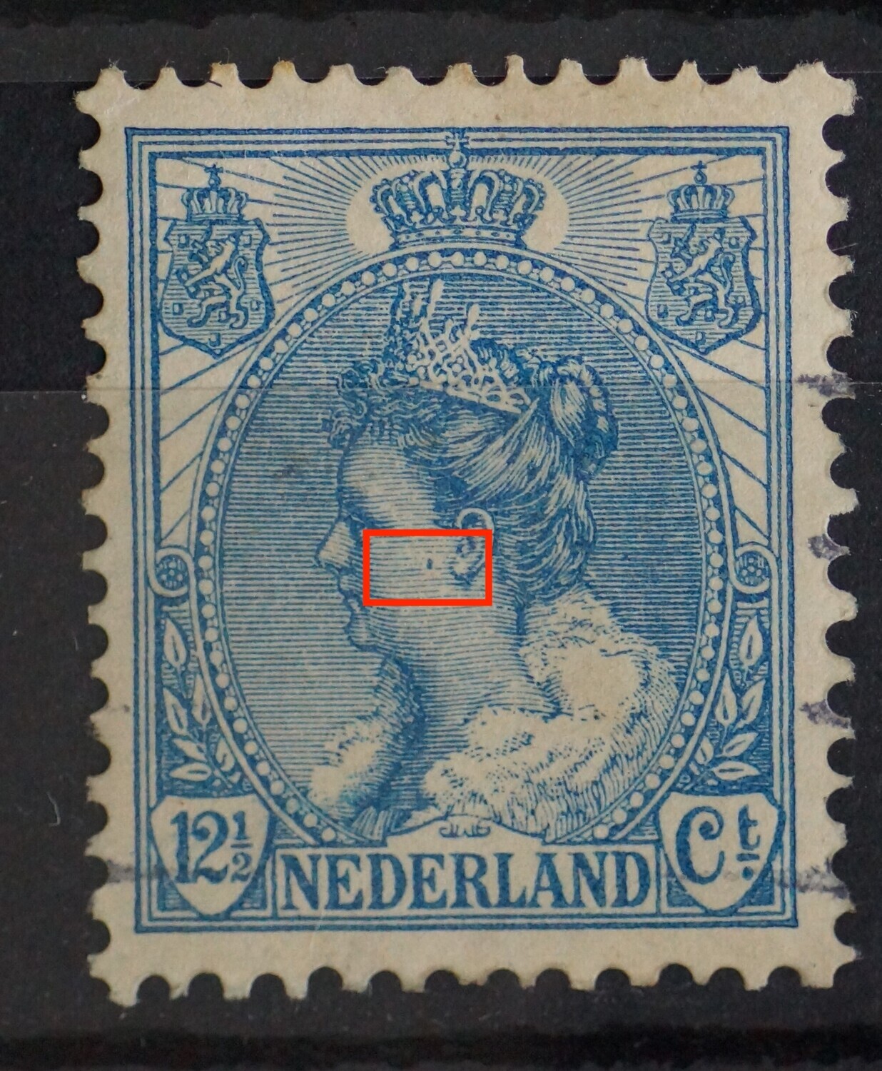 NVPH 63 - blauwe vlek midden in het gezicht