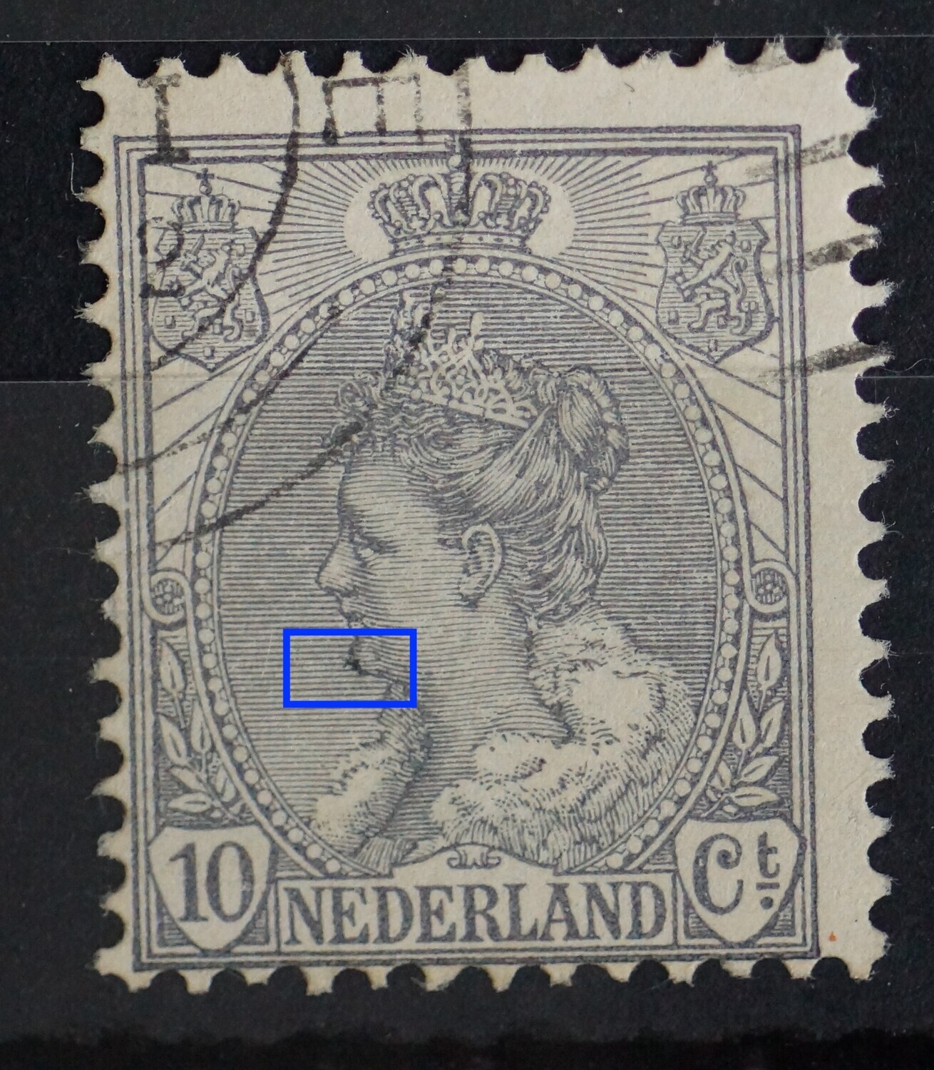 NVPH 62 - zwarte vlek in de vorm van een sterretje op de kin