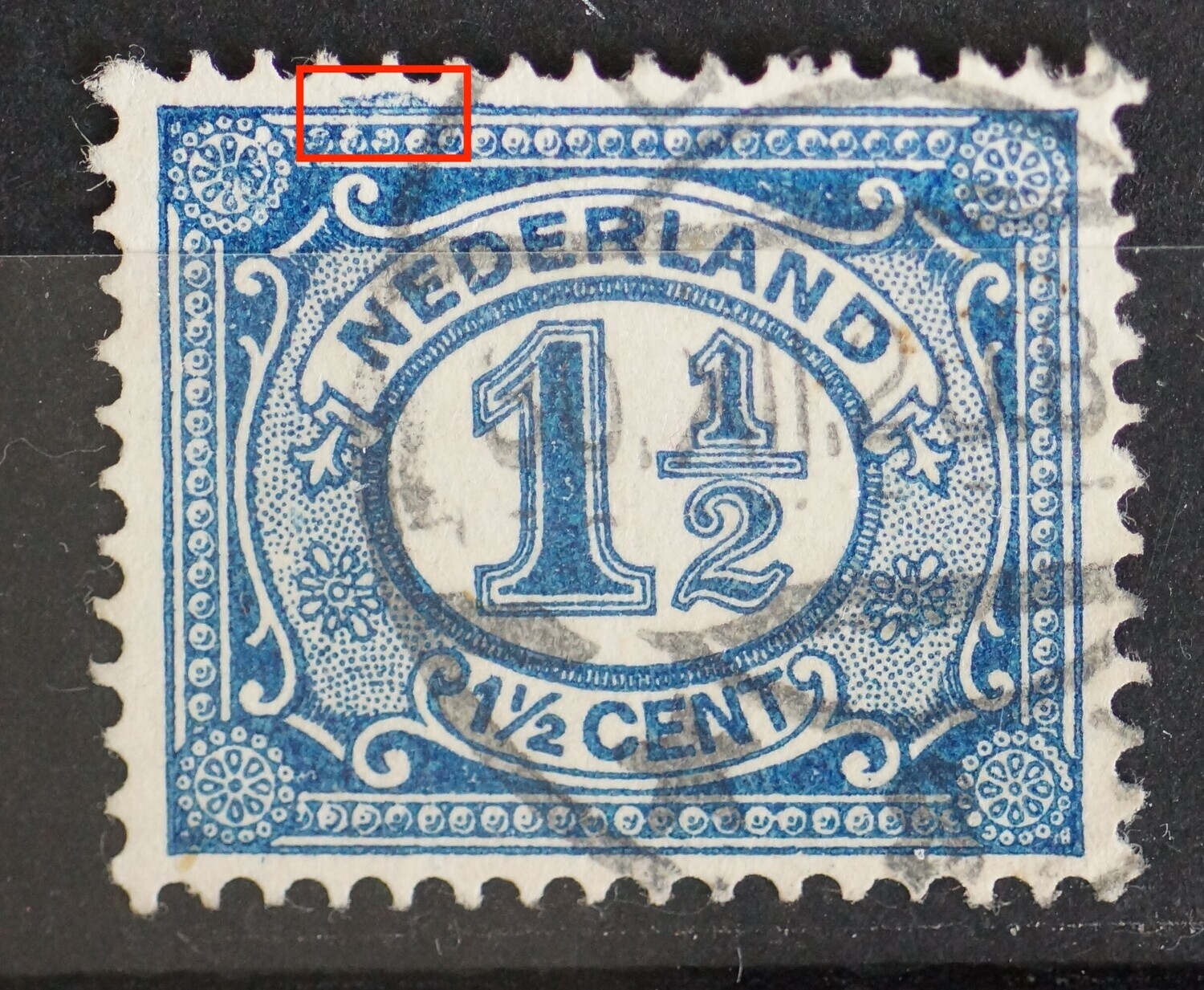 NVPH 53 - blauwe vlek boven de kaderlijn boven, links
