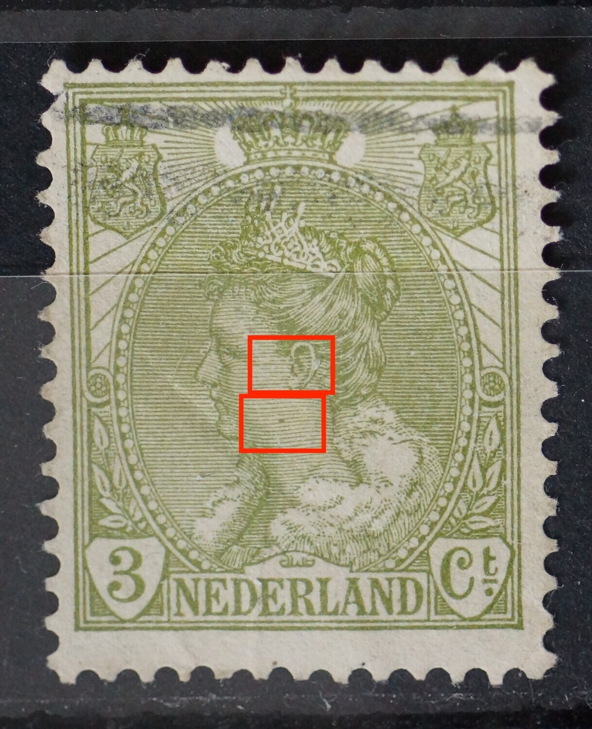 NVPH 57 - beschadiging in het oor en groen vlekje op het gezicht