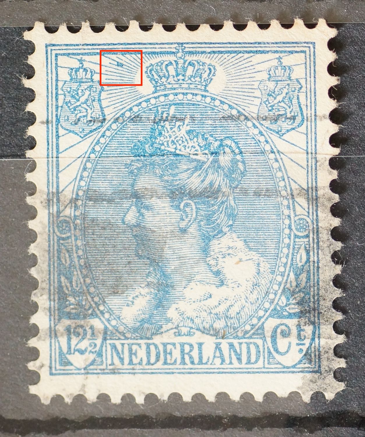 NVPH 63 - blauwe vlek tussen stralen linksboven