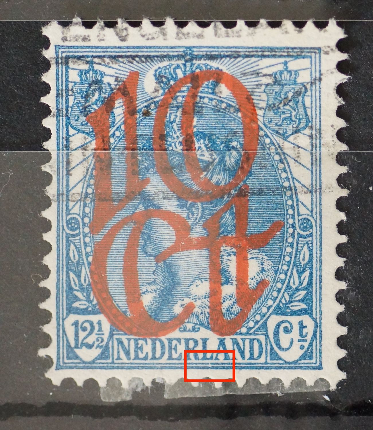 NVPH 118 - breukje in kaderlijnen onder de L van NEDERLAND
