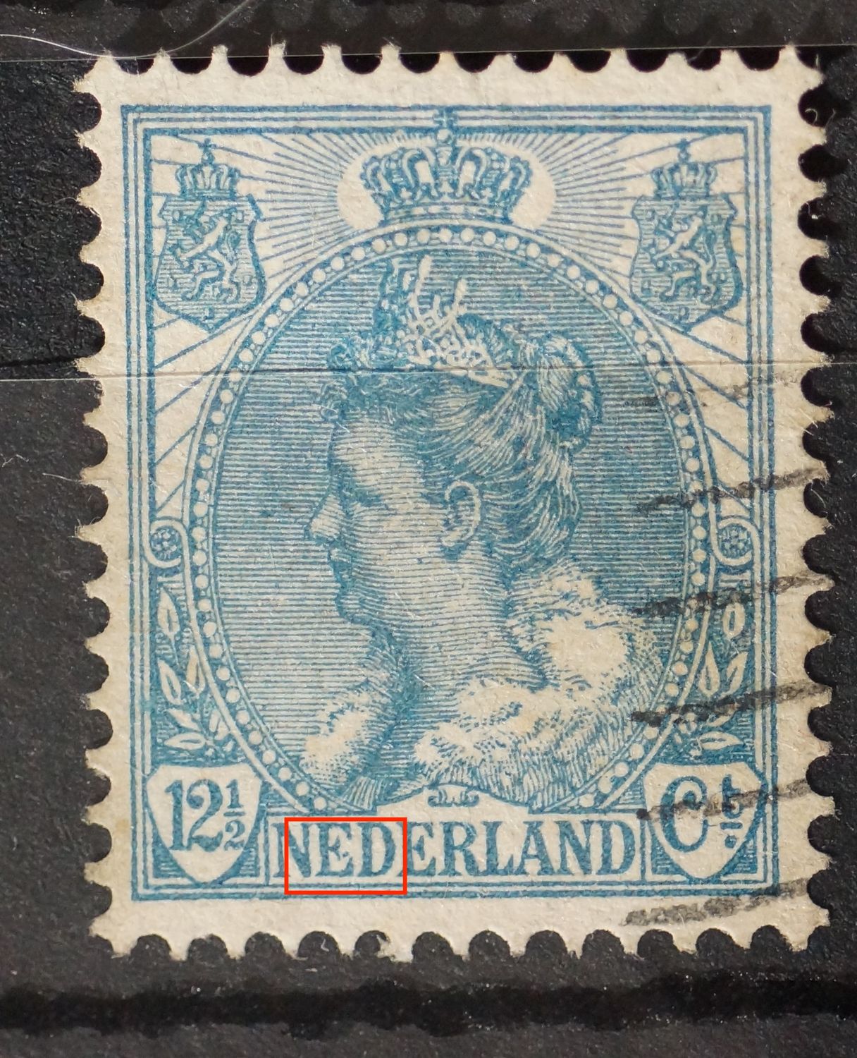 NVPH 63 - blauwe punt bij de 1e E van NEDERLAND