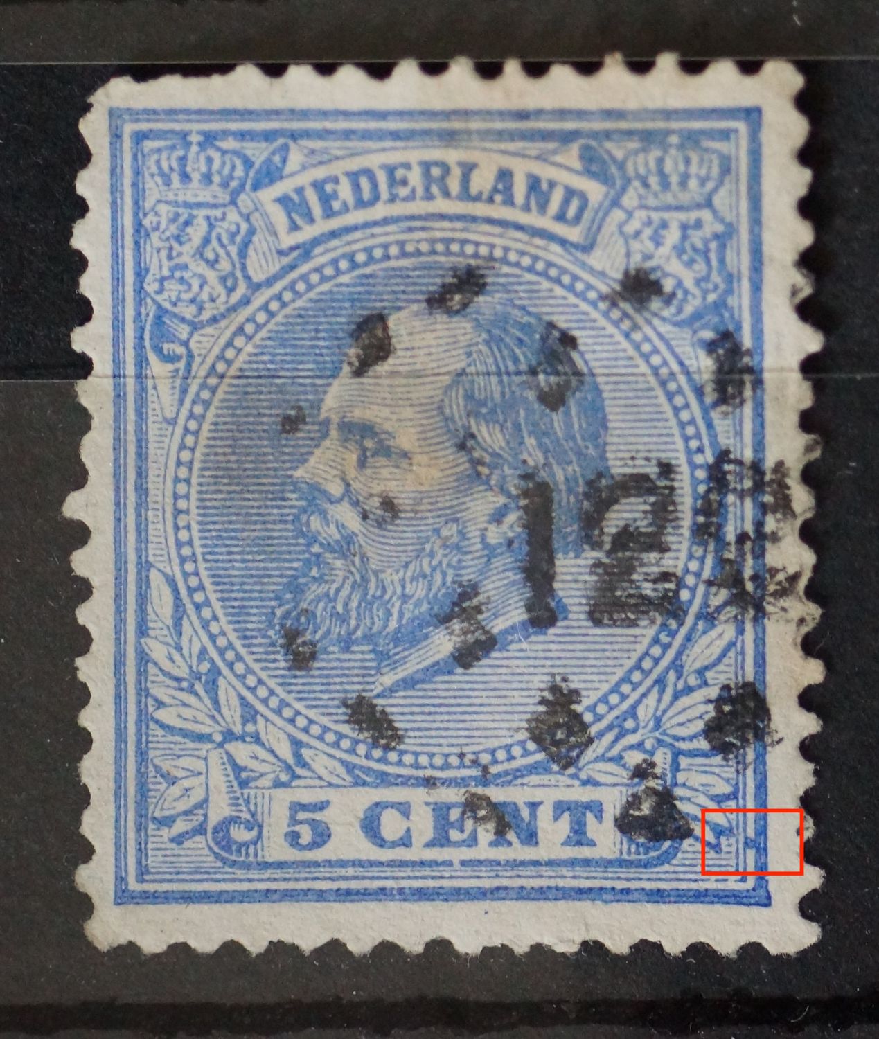 NVPH 19 - blauwe vlek tussen de kaderlijnen rechtsonder