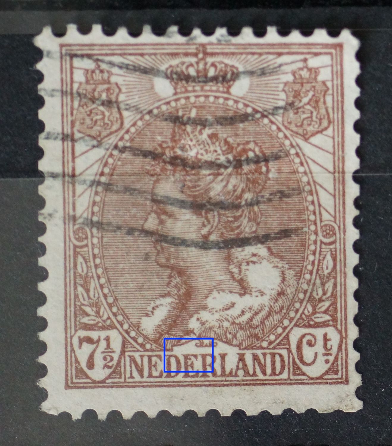 NVPH 61 - bruine punt bovenin de 2e E van NEDERLAND