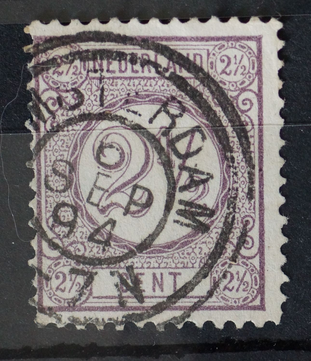 Dubbelringstempel Amsterdam op NVPH 33