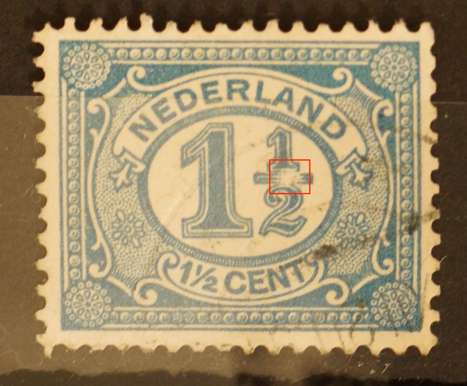 NVPH 53 - grote witte vlek in de breukstreep NVPH 53 - grote witte vlek in de breukstreep