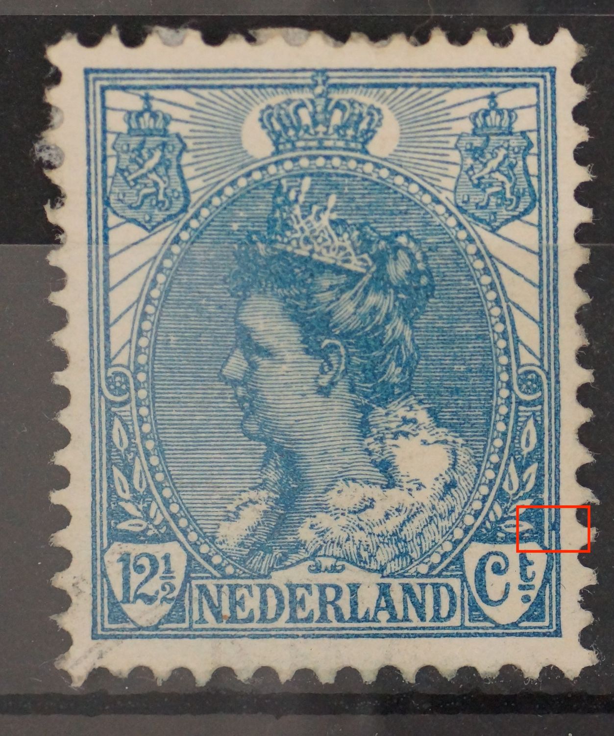 NVPH 63 - blauwe vlek tussen kaderlijnen rechts