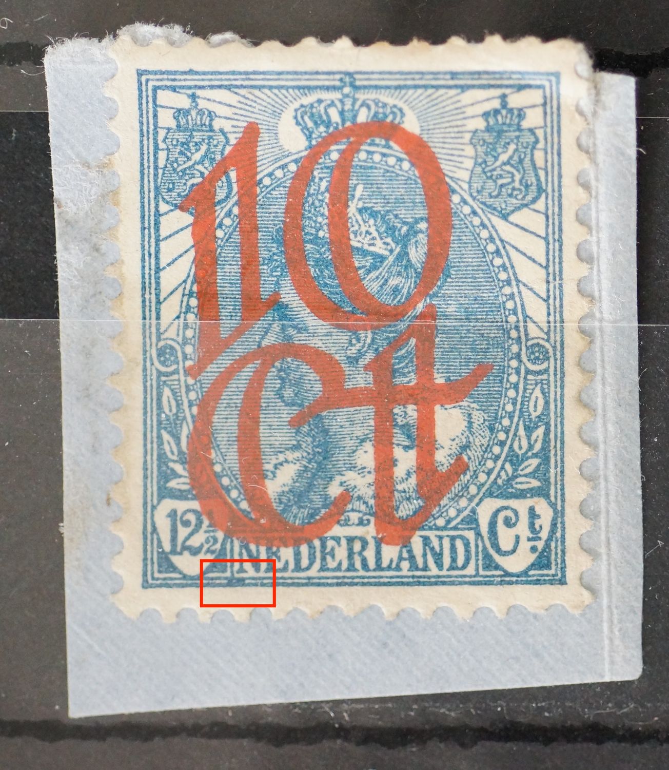NVPH 118 - blauwe vlek tussen kaderlijnen onder de 1e N van NEDERLAND