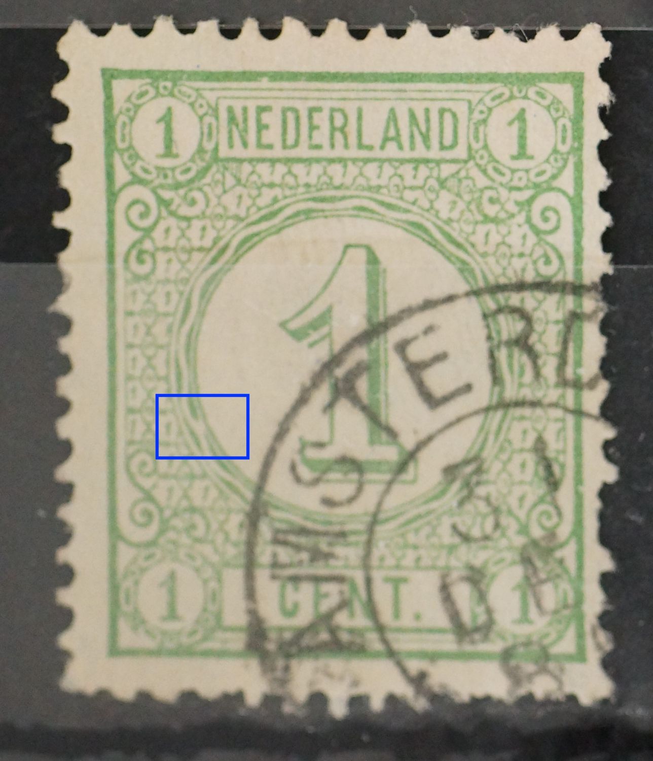 NVPH 31- breuk in rand medaillon (binnenzijde)
