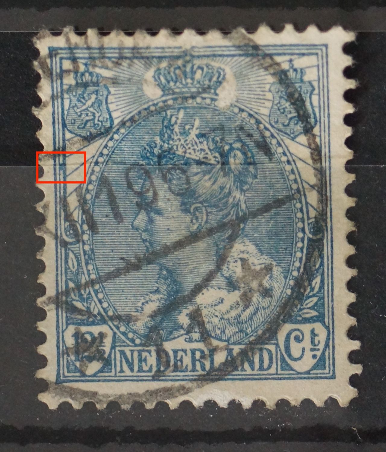 NVPH 63 - blauwe vlek tussen kaderlijnen links
