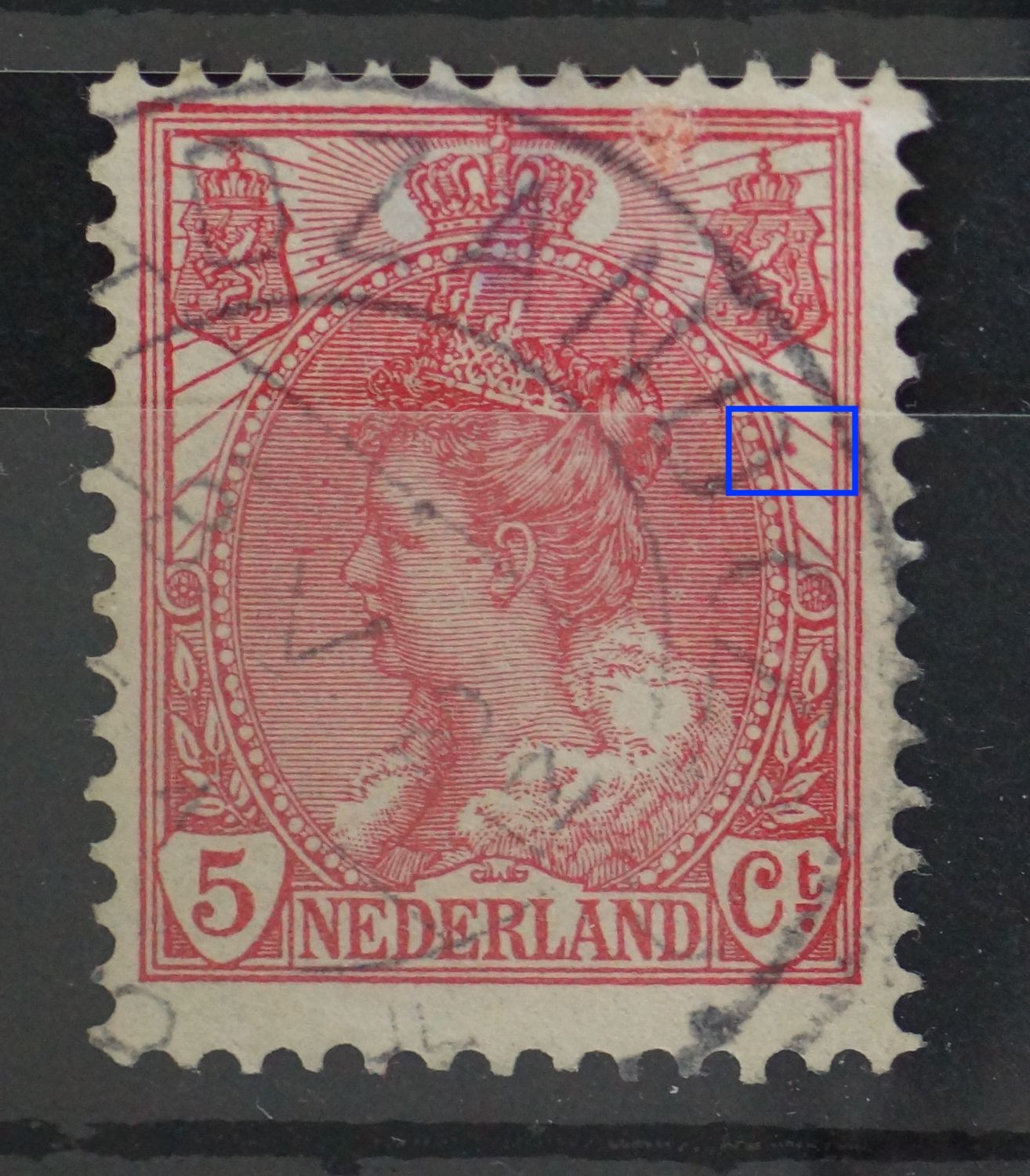 NVPH 60 - rode vlek tussen stralen rechts