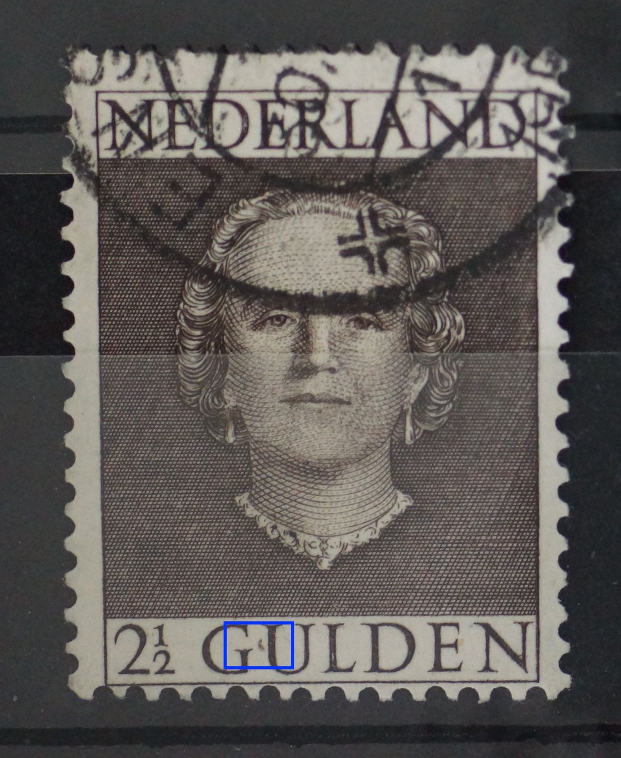 NVPH 535 - grijze 'traan' tussen GU van GULDEN