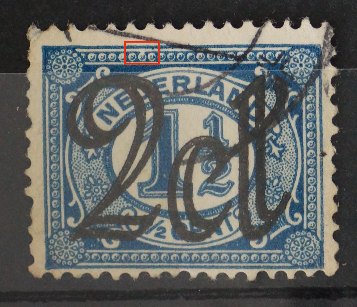NVPH 115 - breuk in parelrand boven