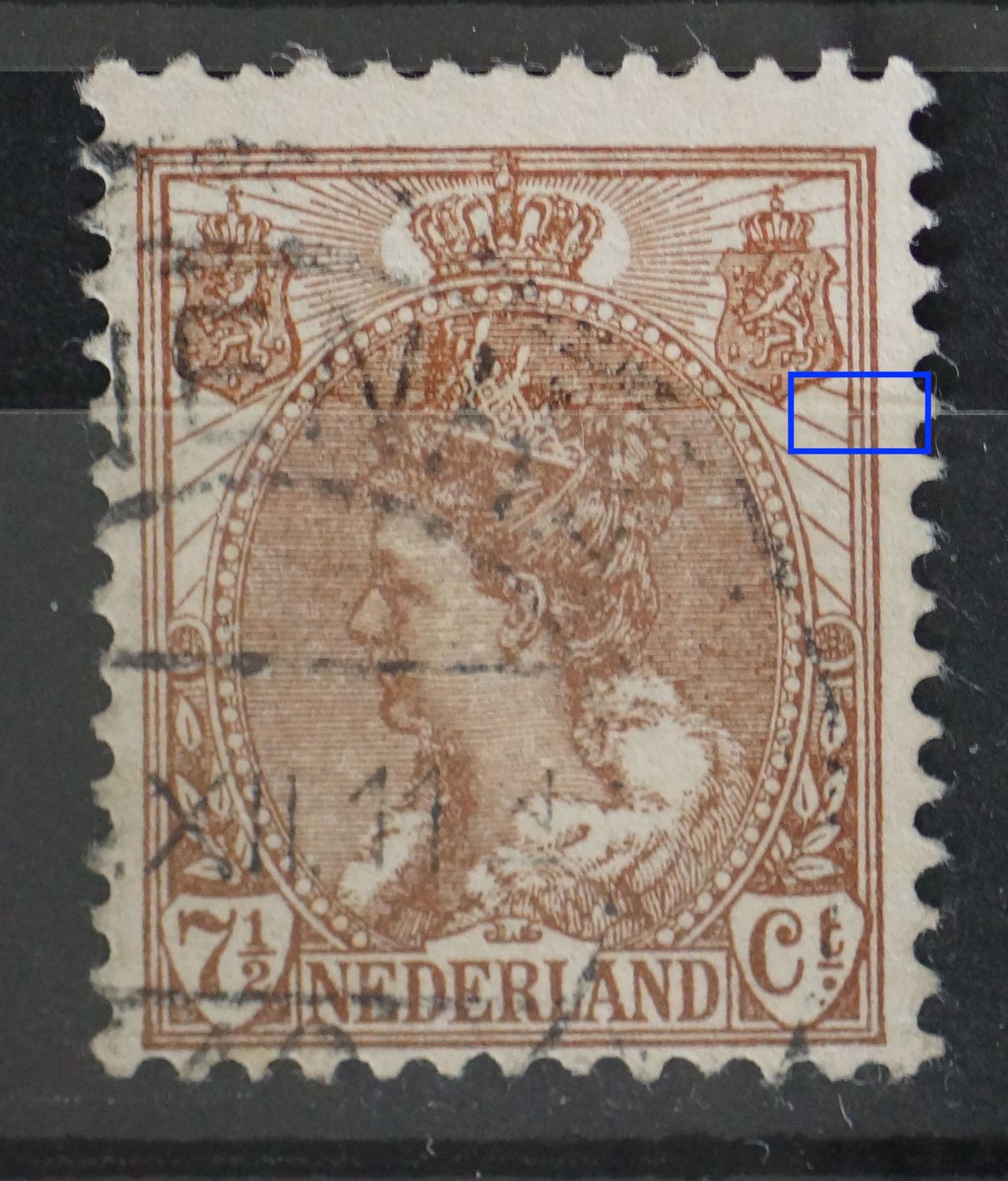 NVPH 61 - bruine vlek tussen kaderlijnen rechts