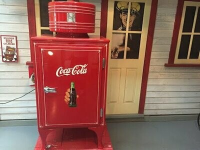 GE Refrigerator With A Coca Cola Theme