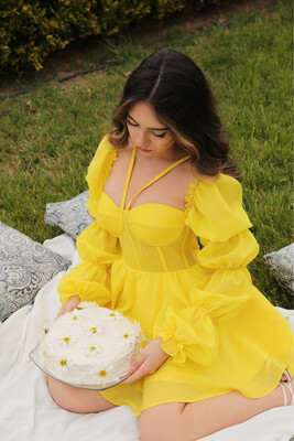 Yellow puffed long sleeves mini corset dress.