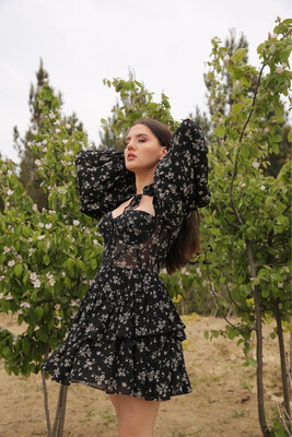 Black floral print corset dress.