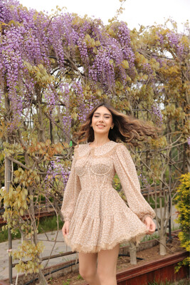 Caramel floral print mini dress with collar.