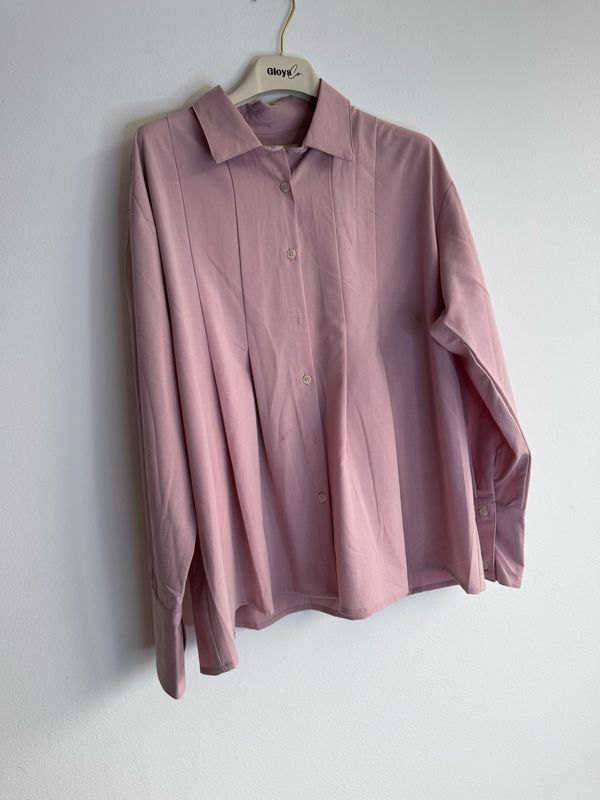 Camisa rosa pliegues