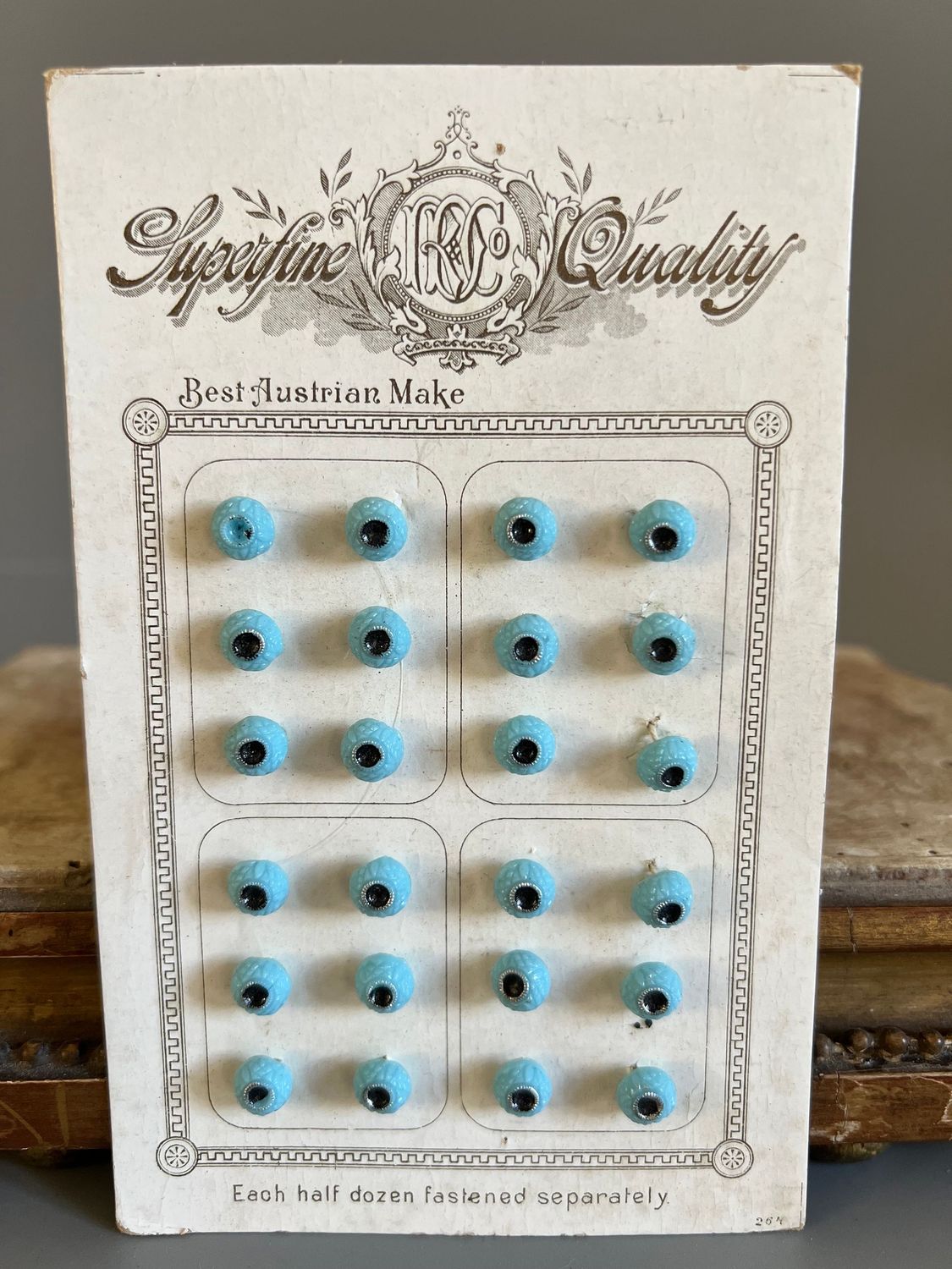 c.1900 24 x Tiny Pale Blue Glass Buttons on Original Card