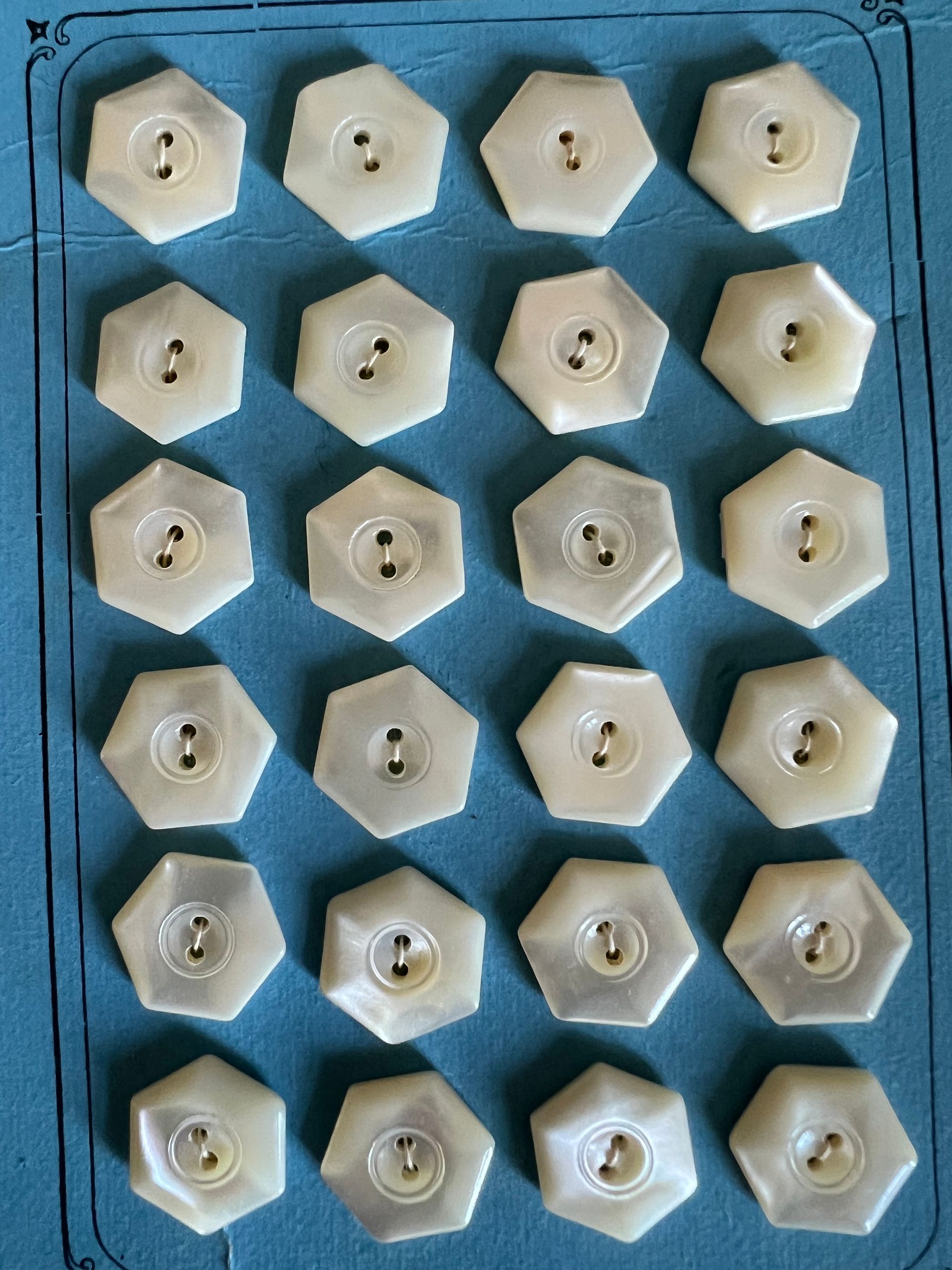 Early 20thc 24 x Carved Mother of Pearl Hexagon Shaped Buttons on Original Card