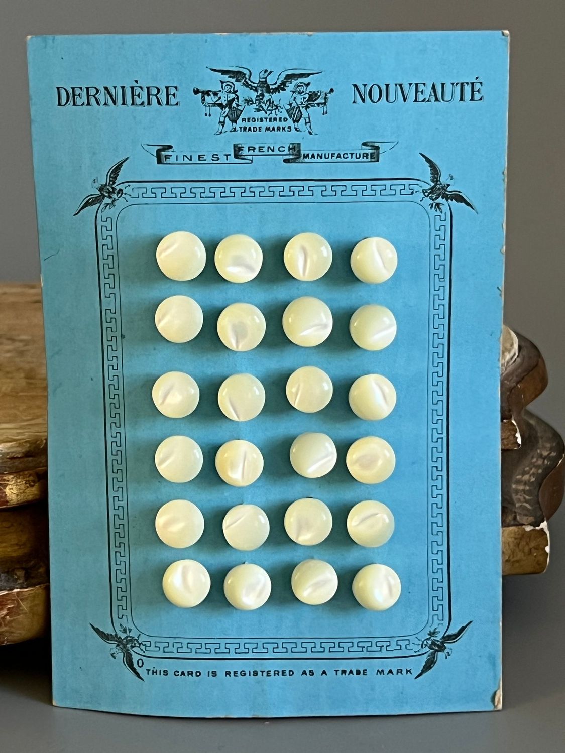 Early 20thc 24 x French Small Round Mother of Pearl Buttons on Original Card