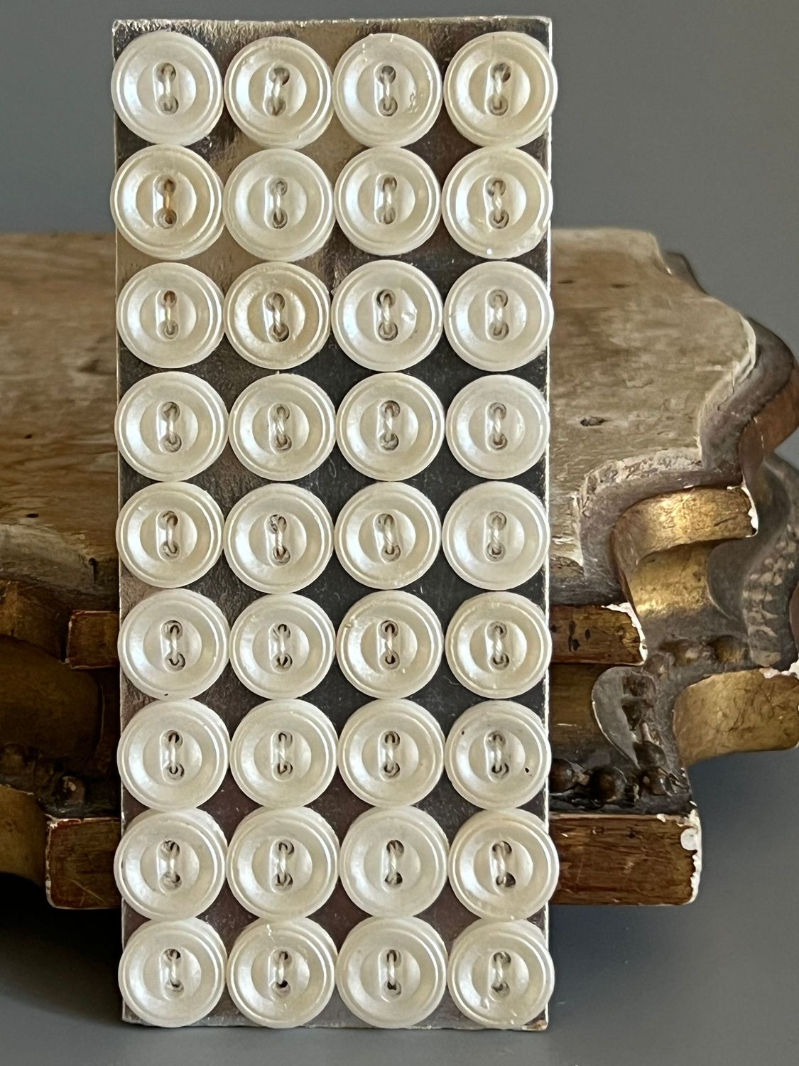 Early 20thc 24 x Small Round Glass Pearlised Buttons on Original Card