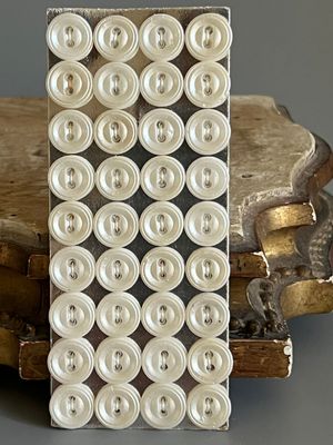 Early 20thc 24 x Small Round Glass Pearlised Buttons on Original Card