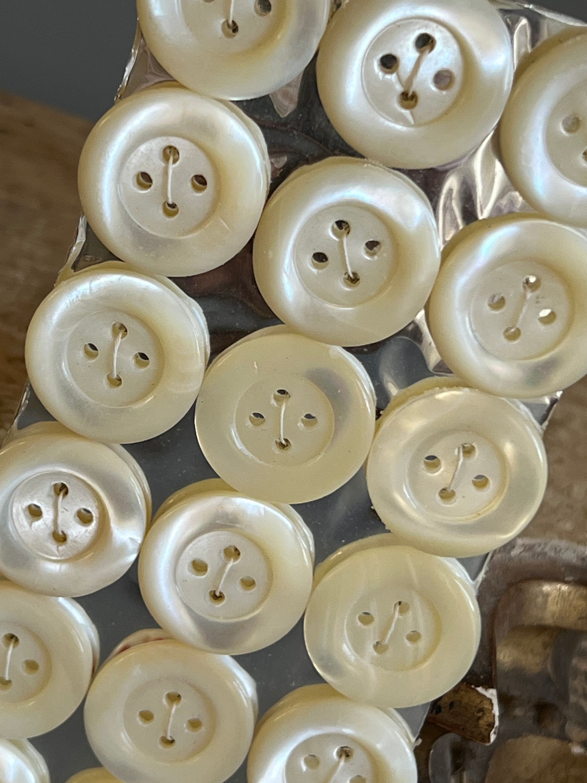 Early 20thc 18 x Mother of Pearl Buttons on Original Card 2cm Diameter