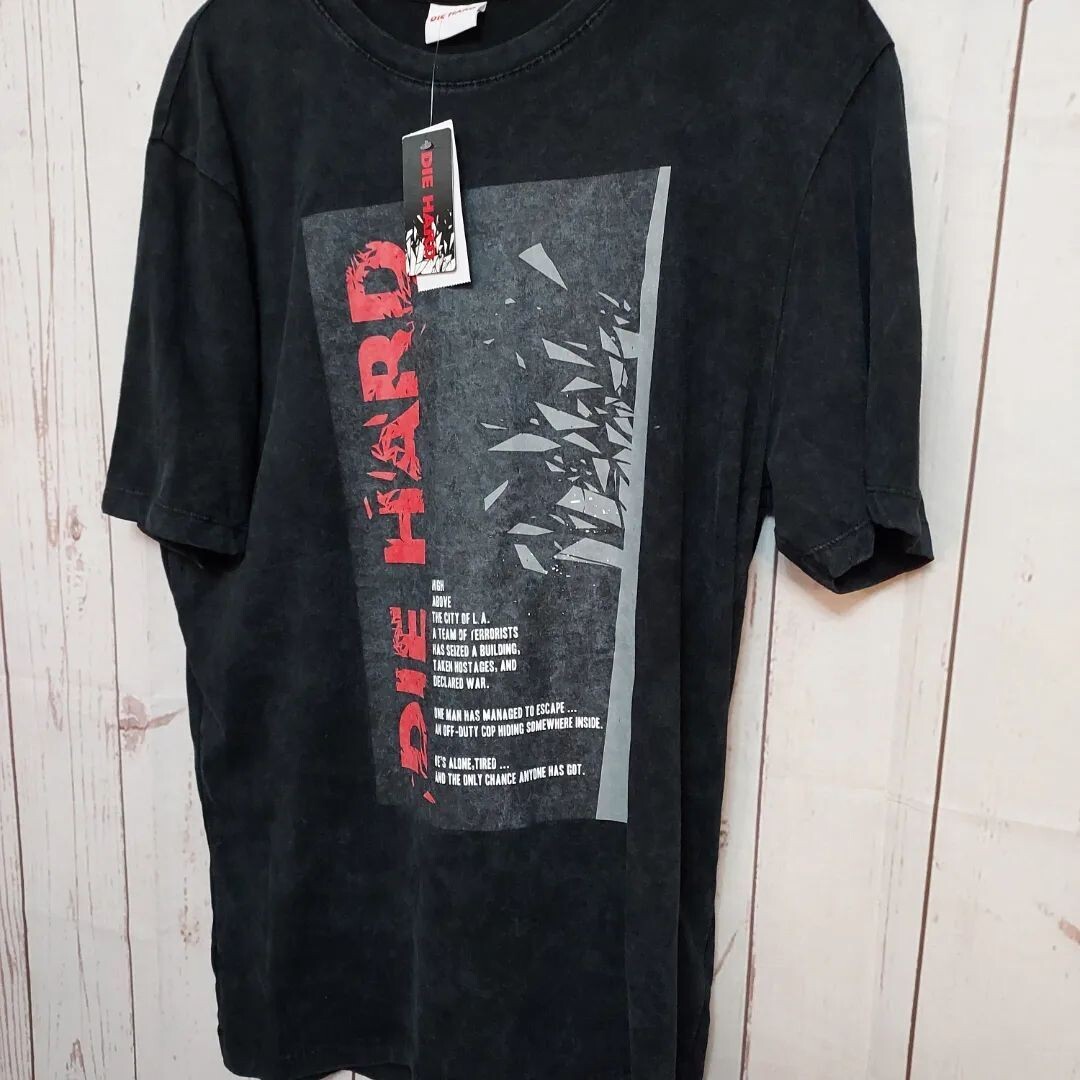 ​A brand new official tee shirt from first the Die Hard film size Larg
